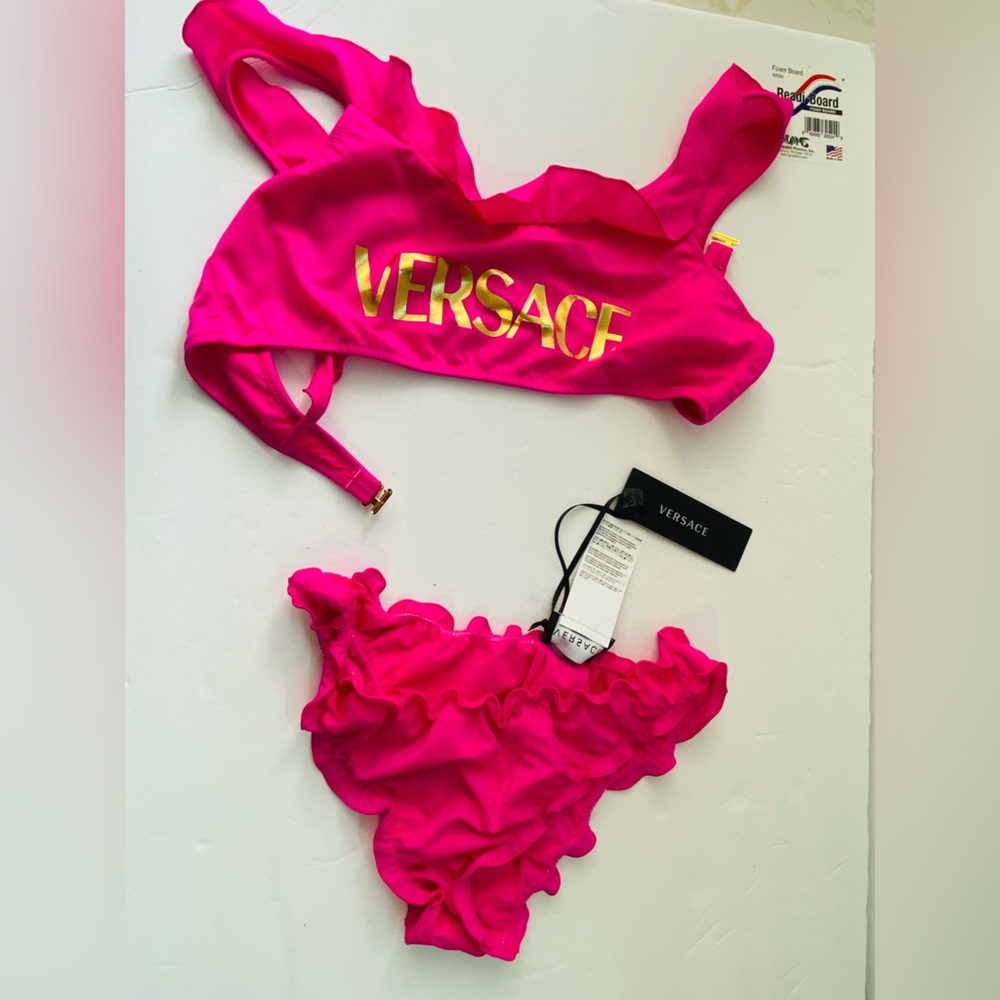 New VERSACE Wonens Pink Gold 
Logo bikini Size 14A